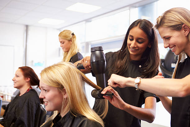 Hands-on blow dry styling practice at Galaxy Academy