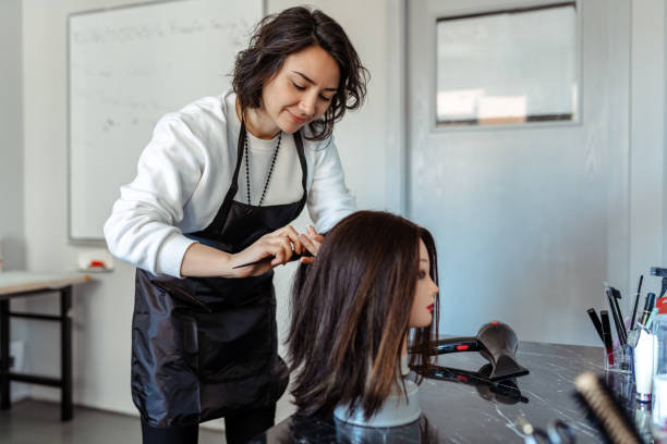 Mannequin precision hair cutting techniques at Galaxy Academy
